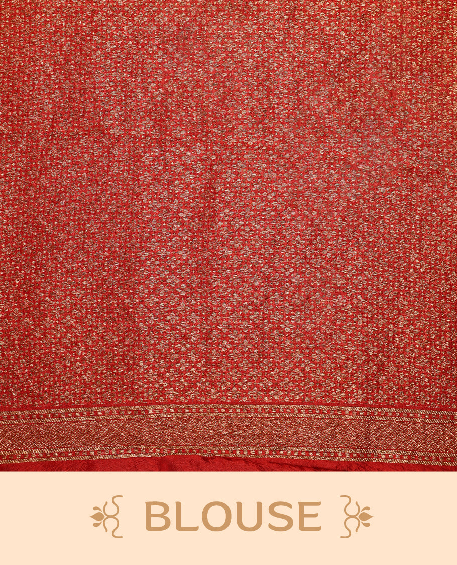 Red colour pure Tussar Banaras saree adorned with delicate golden zari motifs on the body, rich floral woven zari border and grand pallu, paired with a matching blouse for an elegant and regal traditional look.