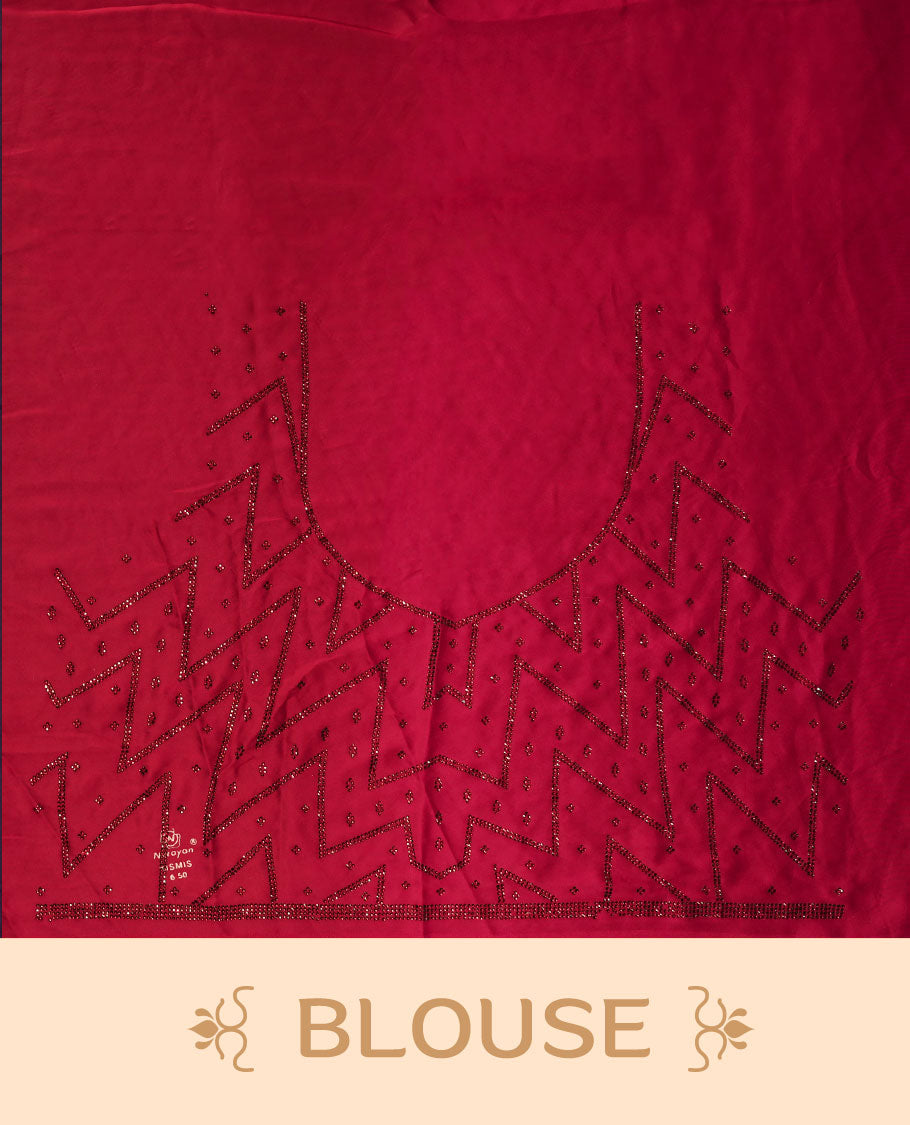 Dark Red Colour net shimmer fancy saree adorned with red stone buttas all over the body, paired with a delicate stone worked border and matching blouse featuring floral vine stone embroidery.