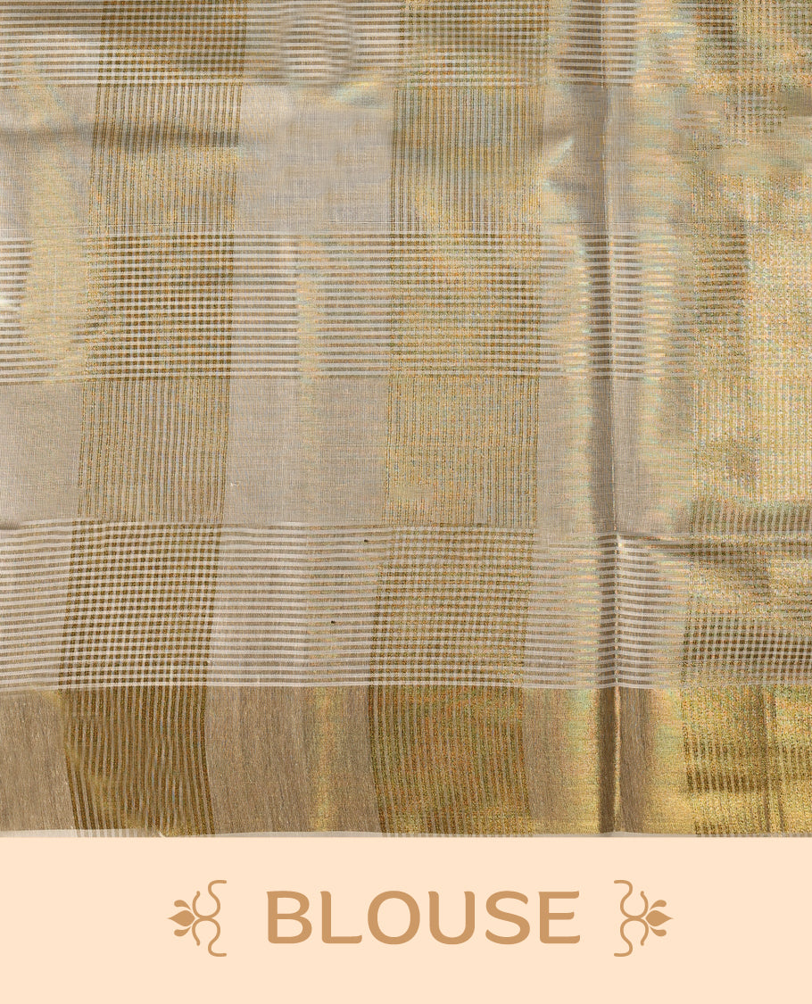 Elegant tissue Kerala saree with a cream base and golden checkered pattern, complemented by a rich golden zari border & Paired with a matching blouse, it's perfect for festive and traditional occasions.