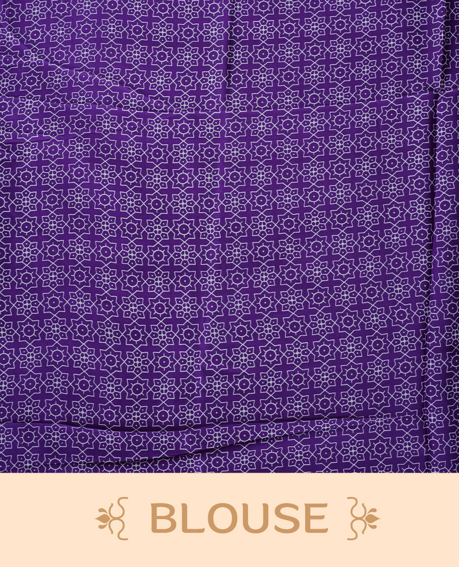 Violet colour semi modal saree featuring white colour geometric borders and fine stripe detailing, finished with an oversized circular motif on the pallu, paired with a matching printed blouse.
