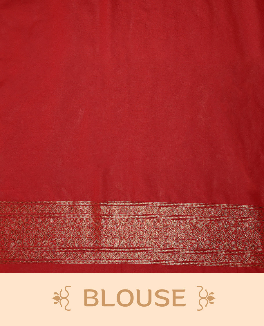 Deep Red colour semi Banaras Katan saree featuring an antique Gold zari jacquard body, complemented by a self colour traditional border with a floral kodi design, paired with a matching blouse