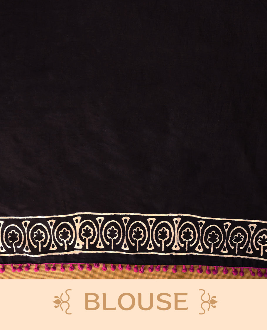 Black cotton saree features intricate white handblock prints, a beautifully detailed border with Pink piping and Self Coloured Blouse