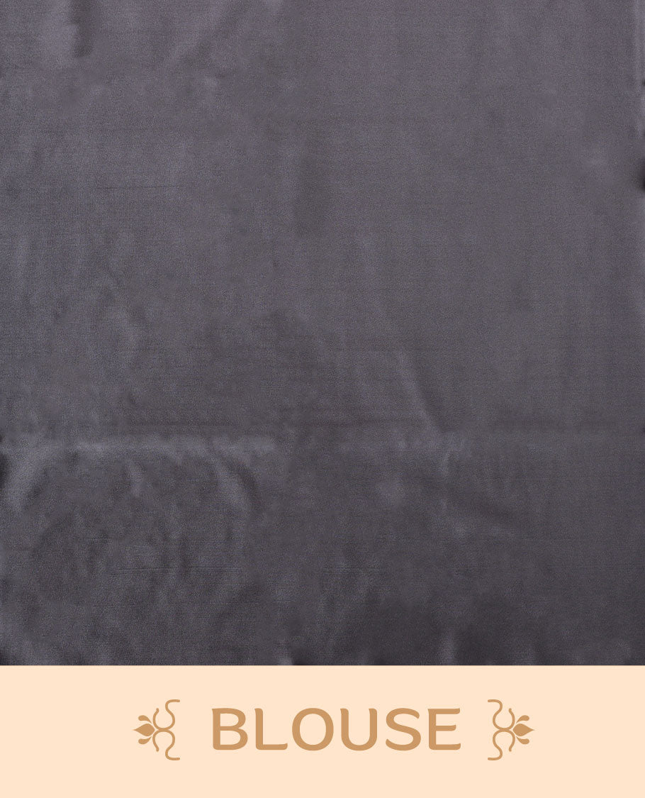 Silver gray colour semi soft silk saree adorned with delicate woven floral kodi motifs on the body, complemented by a Self colour woven pallu with intricate detailing and tassel accents without border & Comes with a matching blouse piece.