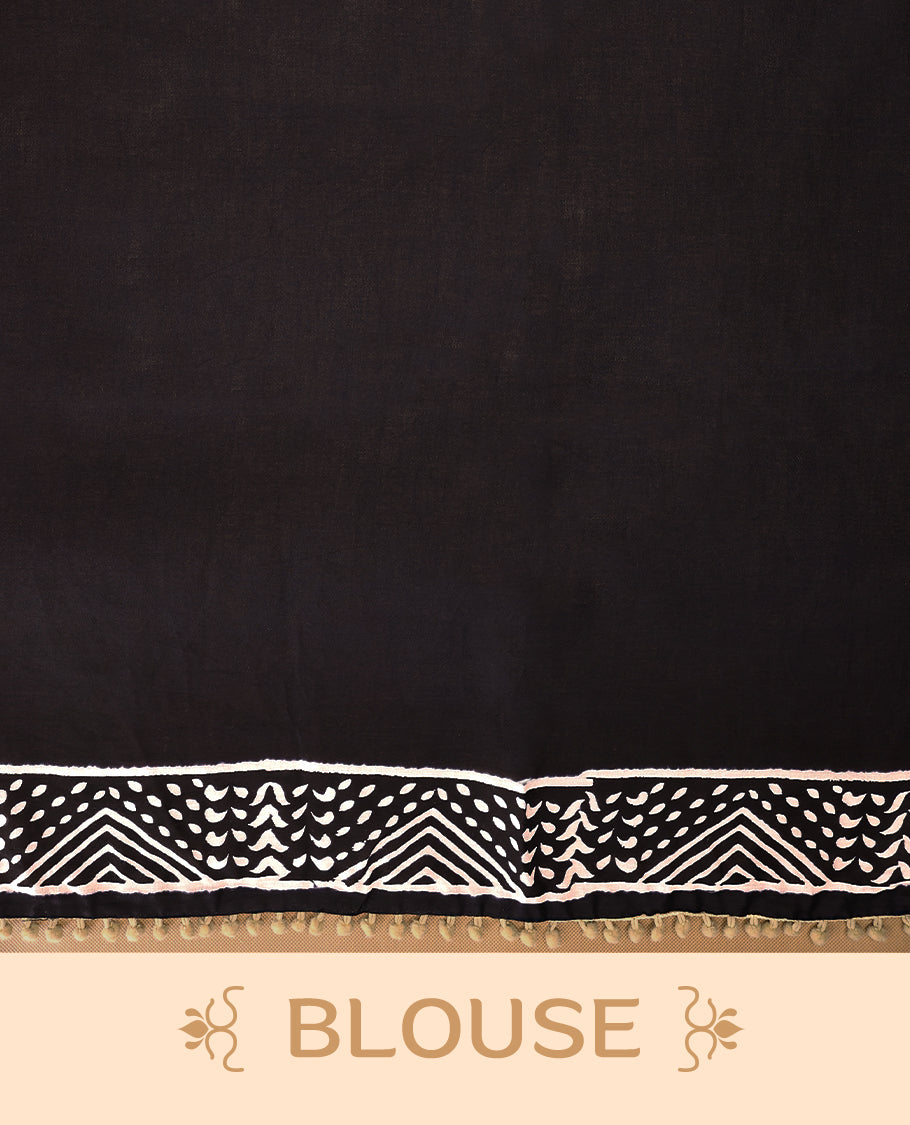 Black cotton saree features intricate white handblock prints, a beautifully detailed border with Beige piping and Self Coloured Blouse