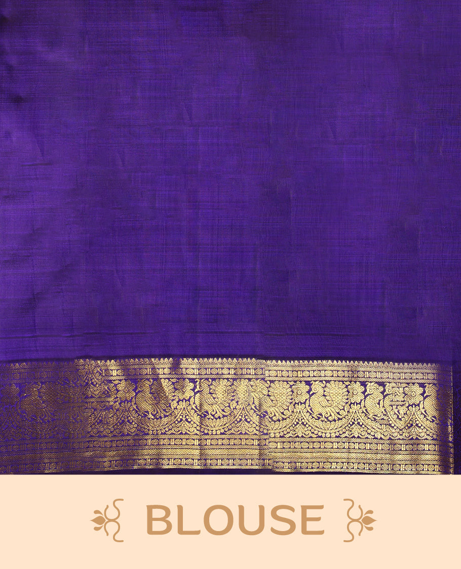 Deep violet colour pure Kancheepuram saree with gold zari Mayoora Chakra motifs on the body, traditional border featuring peacock and floral patterns, grand pallu, and paired with a matching blouse.