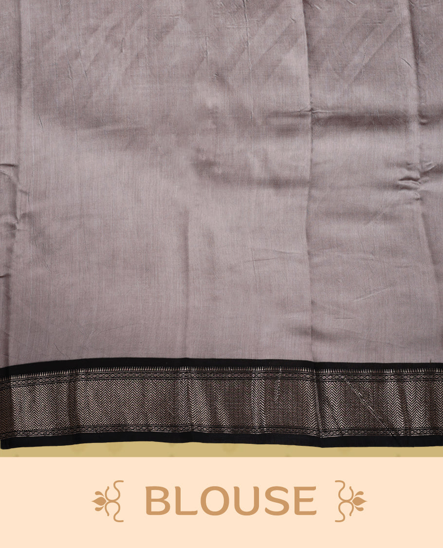 Grey colour saree adorned with bold black floral prints and a rich black zari border and stripped checkered pallu & Comes with a matching blouse piece.