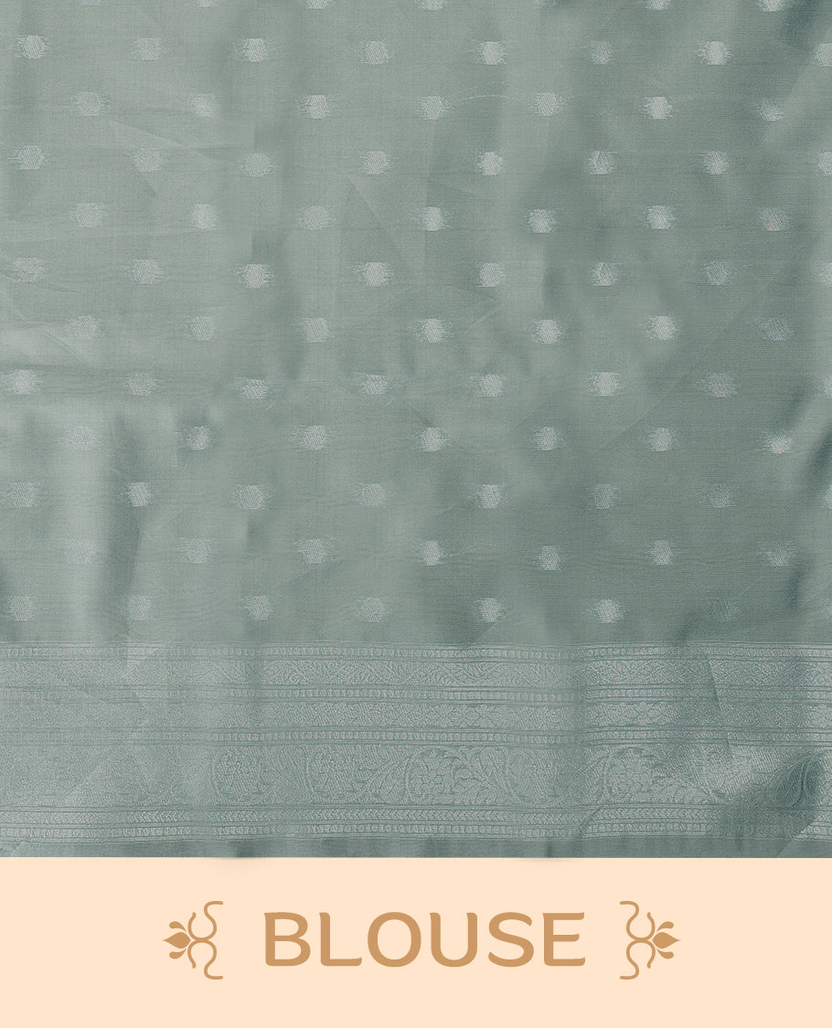 Pastel Grey coloured semi silk saree featuring a Silver coloured Zari Diamond design on the body, paired with a Self coloured border and matching blouse.