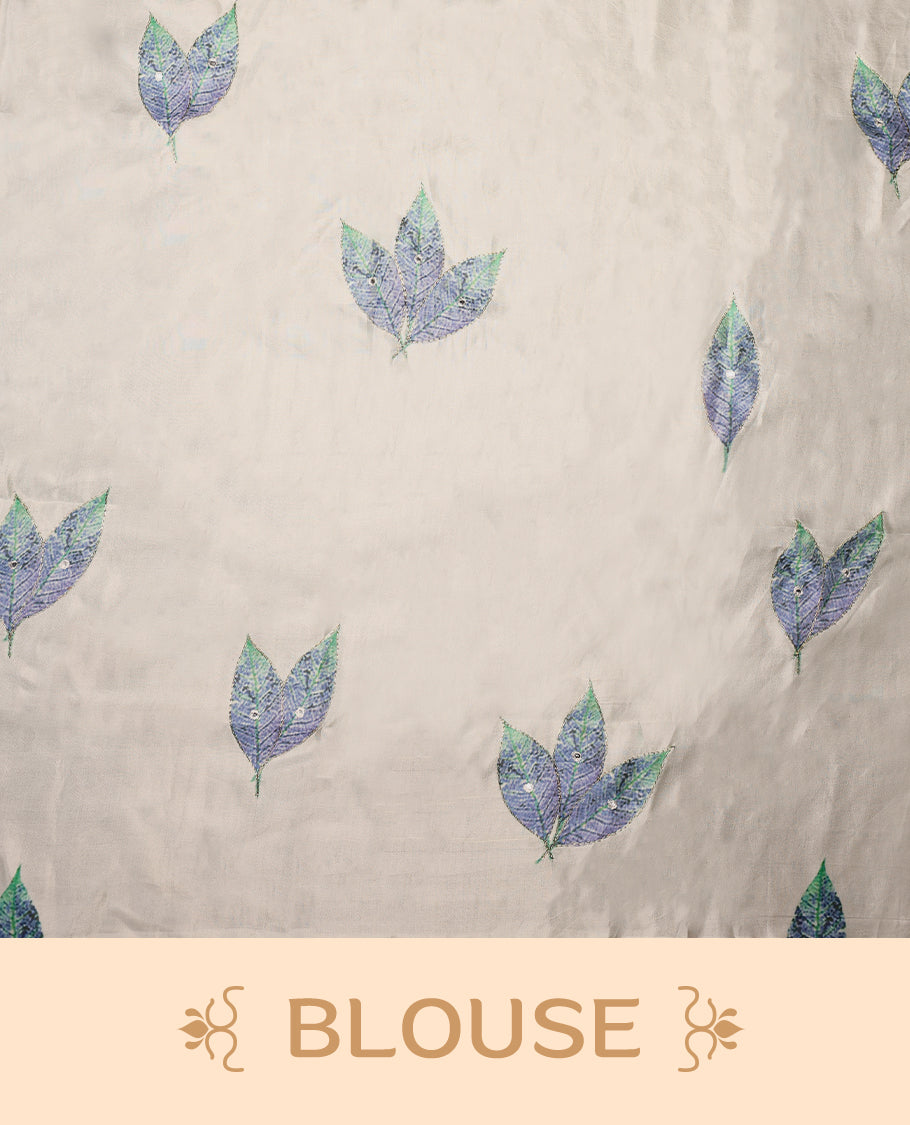 White colour pure organza silk saree featuring digitally printed fancy floral designs, adorned with delicate small mirror work, and finished with an elegant scalloped border, paired with a self colour crepe printed blouse