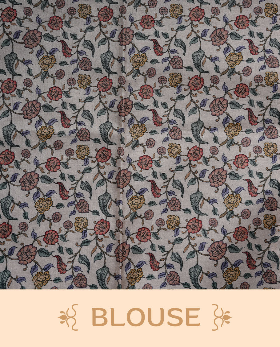 Cream off-white semi tusser silk saree featuring artistic floral and elephant motifs on the pallu with subtle contrast detailing along the border, paired with a matching printed blouse.