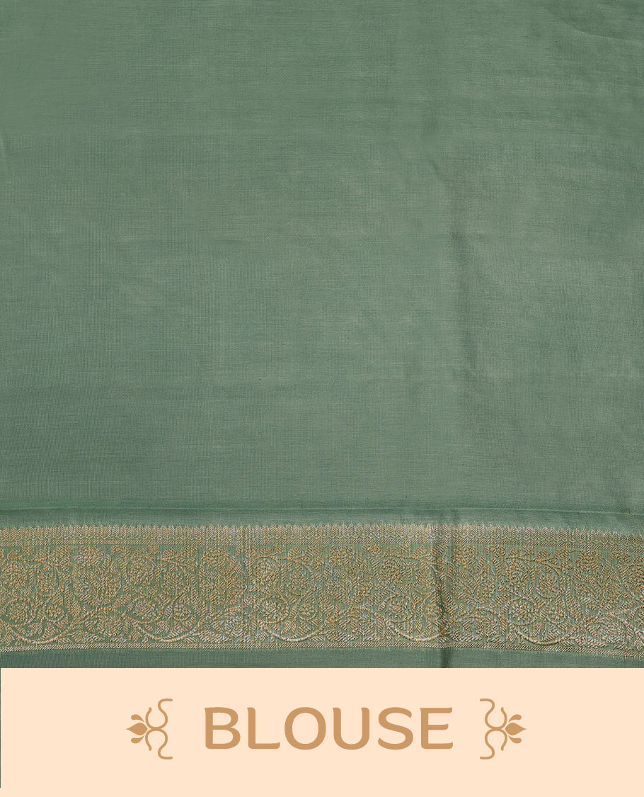 Light Aqua colour pure Banarasi Chanderi cotton, beautifully adorned with traditional antique zari Small Butta designs across the body, completed with a hand-dyed colour, a traditional border, and a matching blouse.