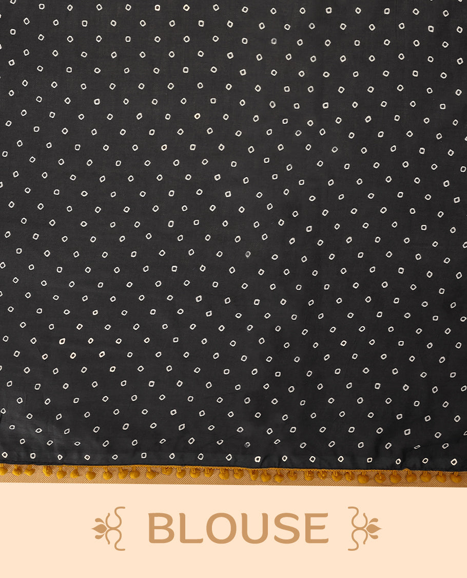 Black cotton saree features intricate white handblock prints, a beautifully detailed border with mustard piping and Self Coloured Blouse