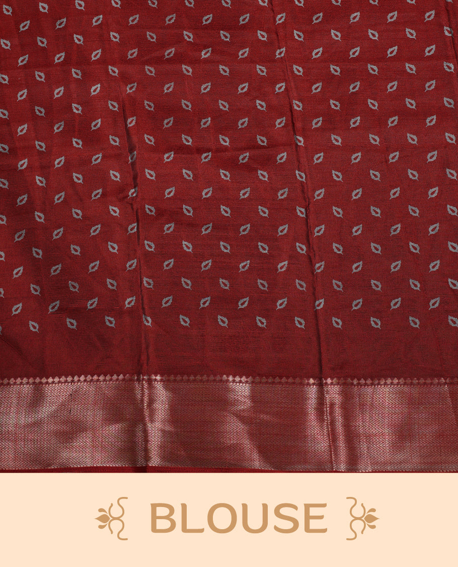 Black colour saree adorned with intricate floral motifs in subtle hues, featuring a rich maroon zari border and a beautifully woven contrasting pallu & Comes with a matching blouse piece.