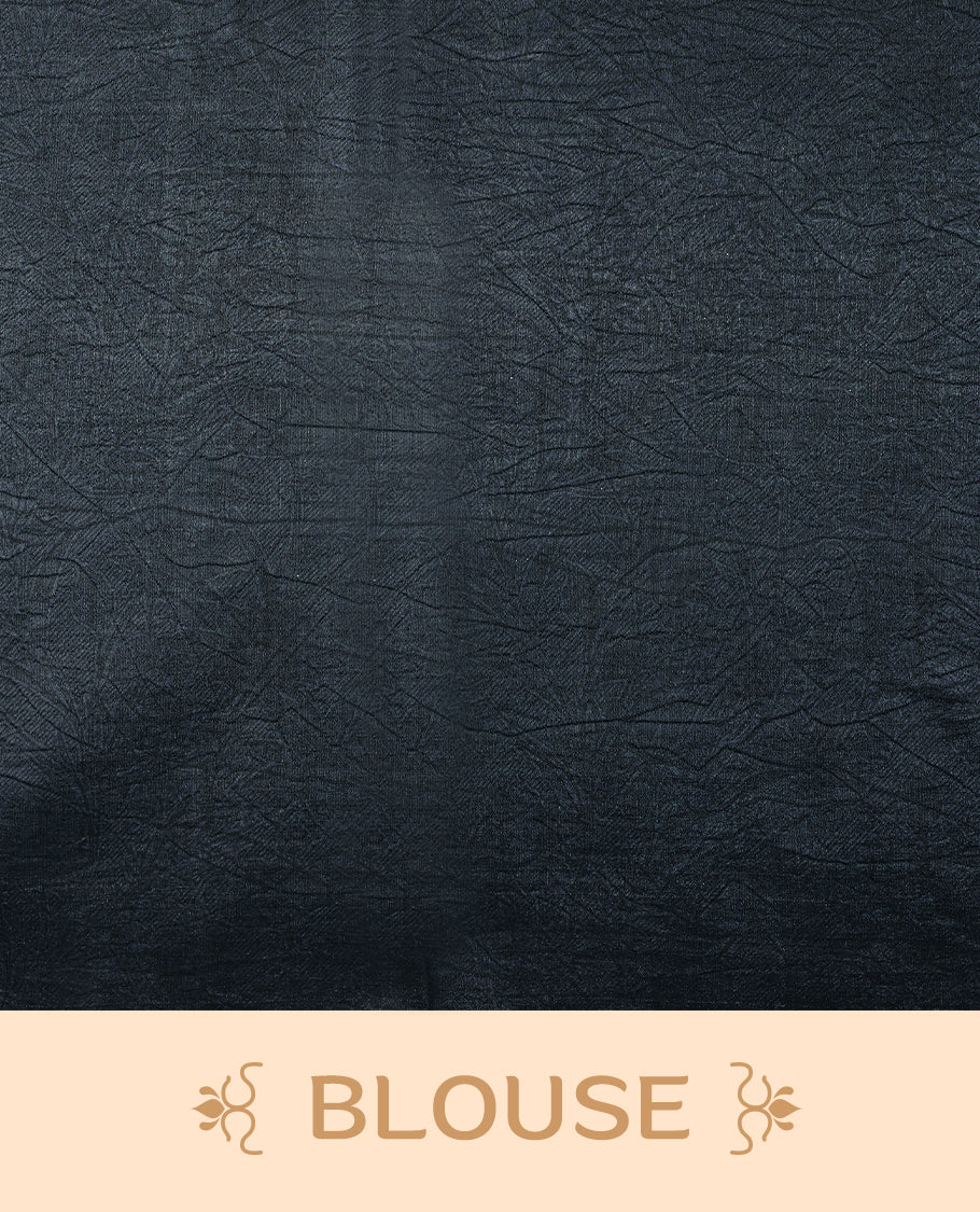 Midnight blue colour Manipuri saree featuring oversized teal floral motifs, finished without a border, and paired with a matching blouse.