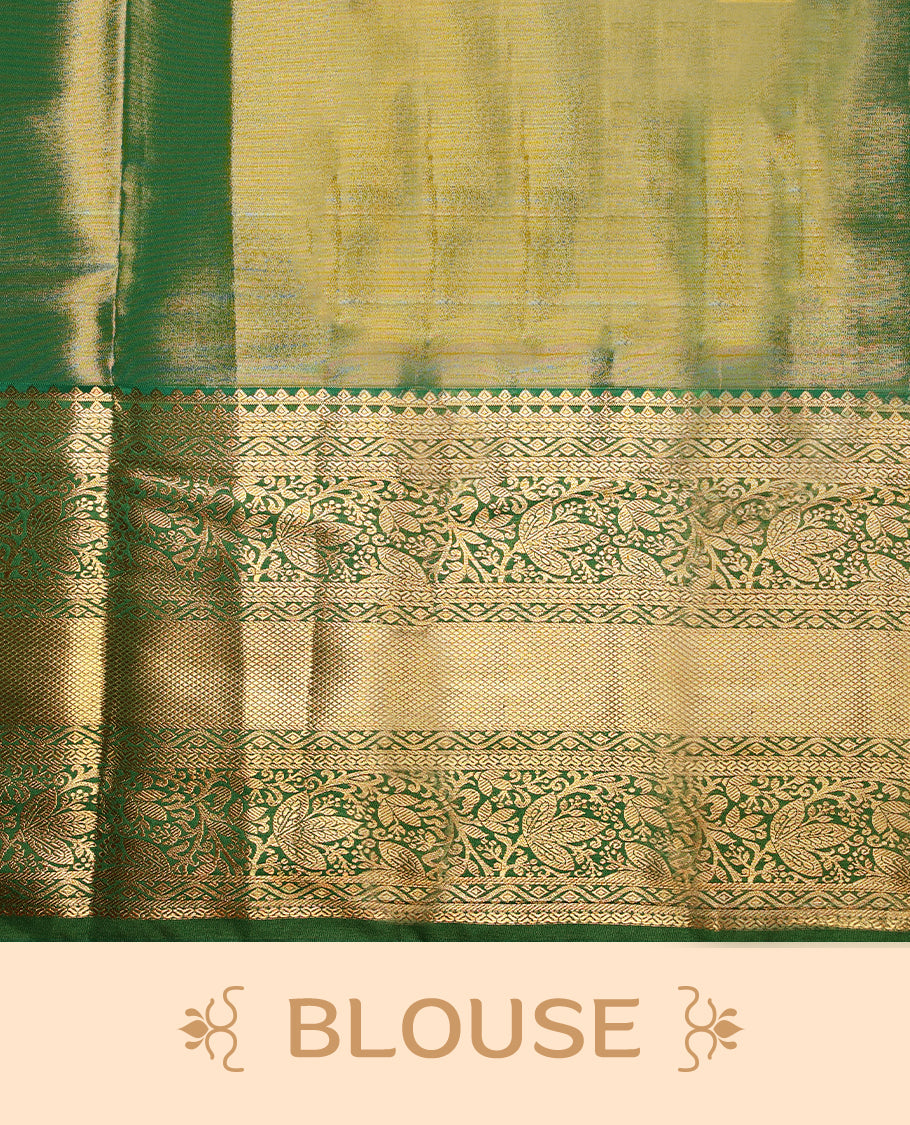 Gold colour tissue brocade saree with gold and silver zari flower and Diamond pattern on body, gold zari floral kodi work Green border, rich matching pallu with Antique zari motifs, paired with matching blouse.