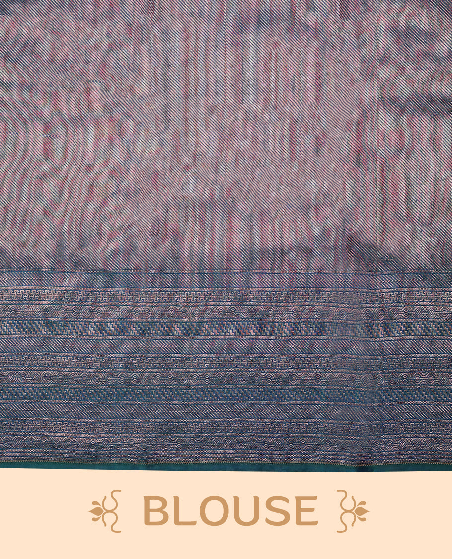 Peacock Blue Colour Manthrakodi saree featuring an antique zari Banarasi design on the body, complemented by a self coloured traditional border and a matching self coloured blouse.