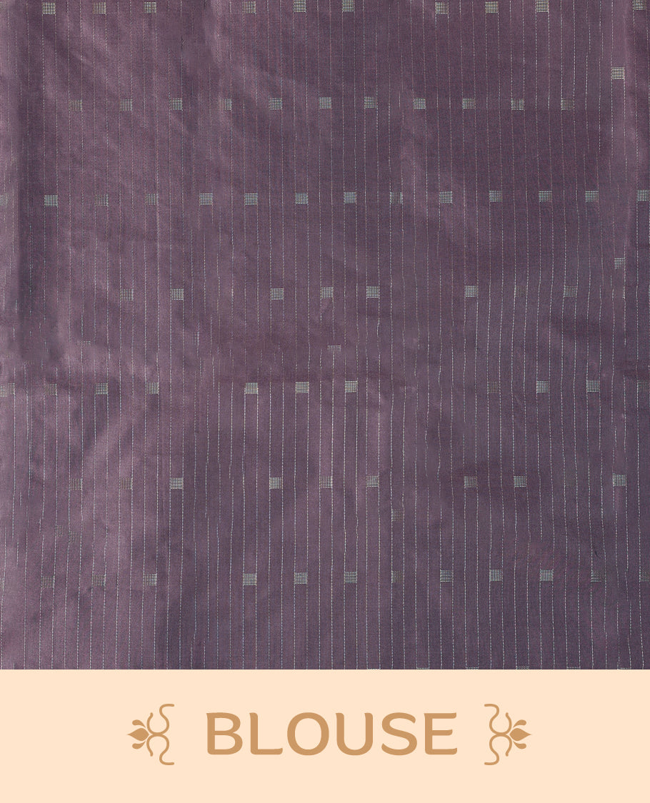 Mauve Colour semi silk saree features subtle square and stripe motifs across the body, comes without a border and paired with a matching blouse.