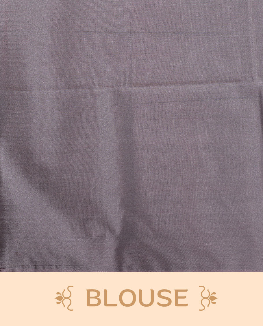 Pine green colour semi soft silk saree adorned with delicate woven floral motifs on the body, complemented by a contrast dusty pink colour woven pallu with intricate detailing and tassel accents without border & Comes with a matching blouse piece.