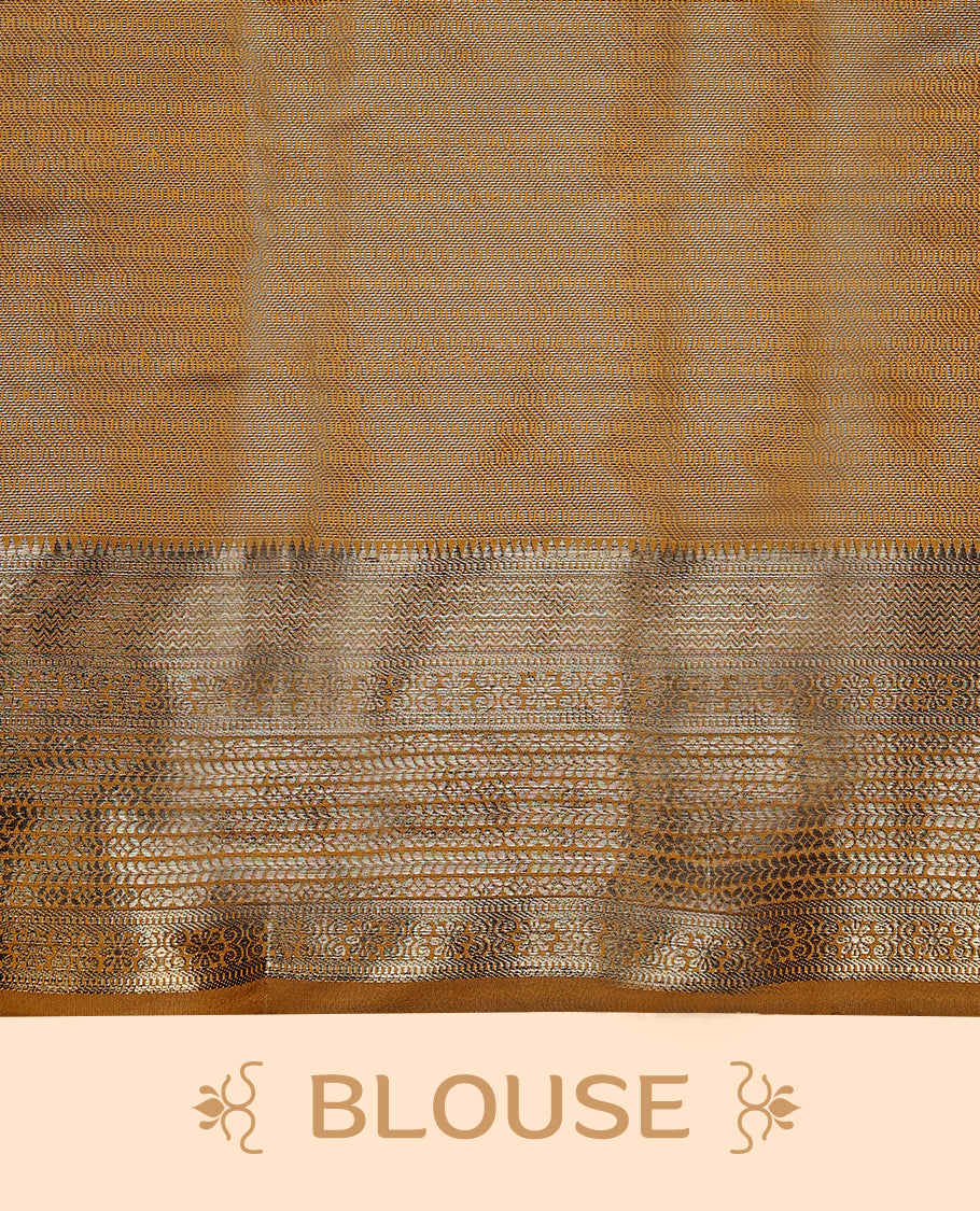 Mustard Art Soft Silk Saree showcases intricate silver zari work on the body and border, paired with a matching blouse