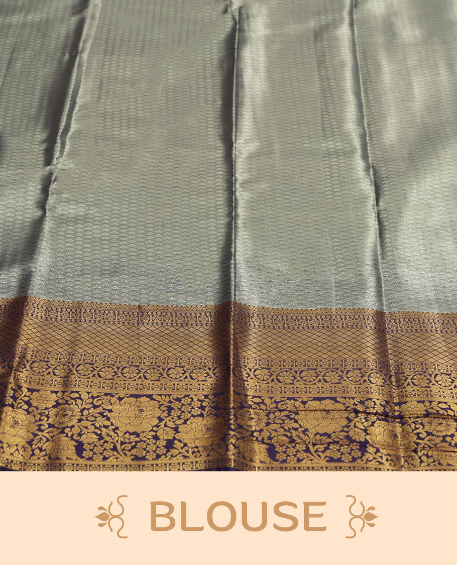 Aqua green colour and antique gold Zari Tissue Brocade Saree features intricate floral Motifs on body and rich Violet colour with traditioal Border & pallu with Gold Zari Patterns paired with matching blouse
