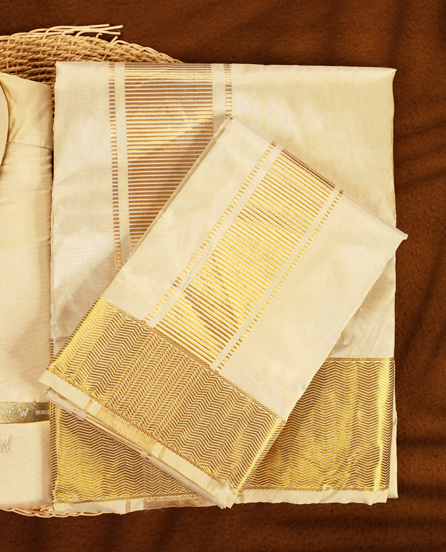 Fawn gold coloured silk wedding shirt, dhoti, and towel set from MINISTER WHITE, embellished with a classic gold zari border, perfect for weddings, festive functions, and traditional occasions.