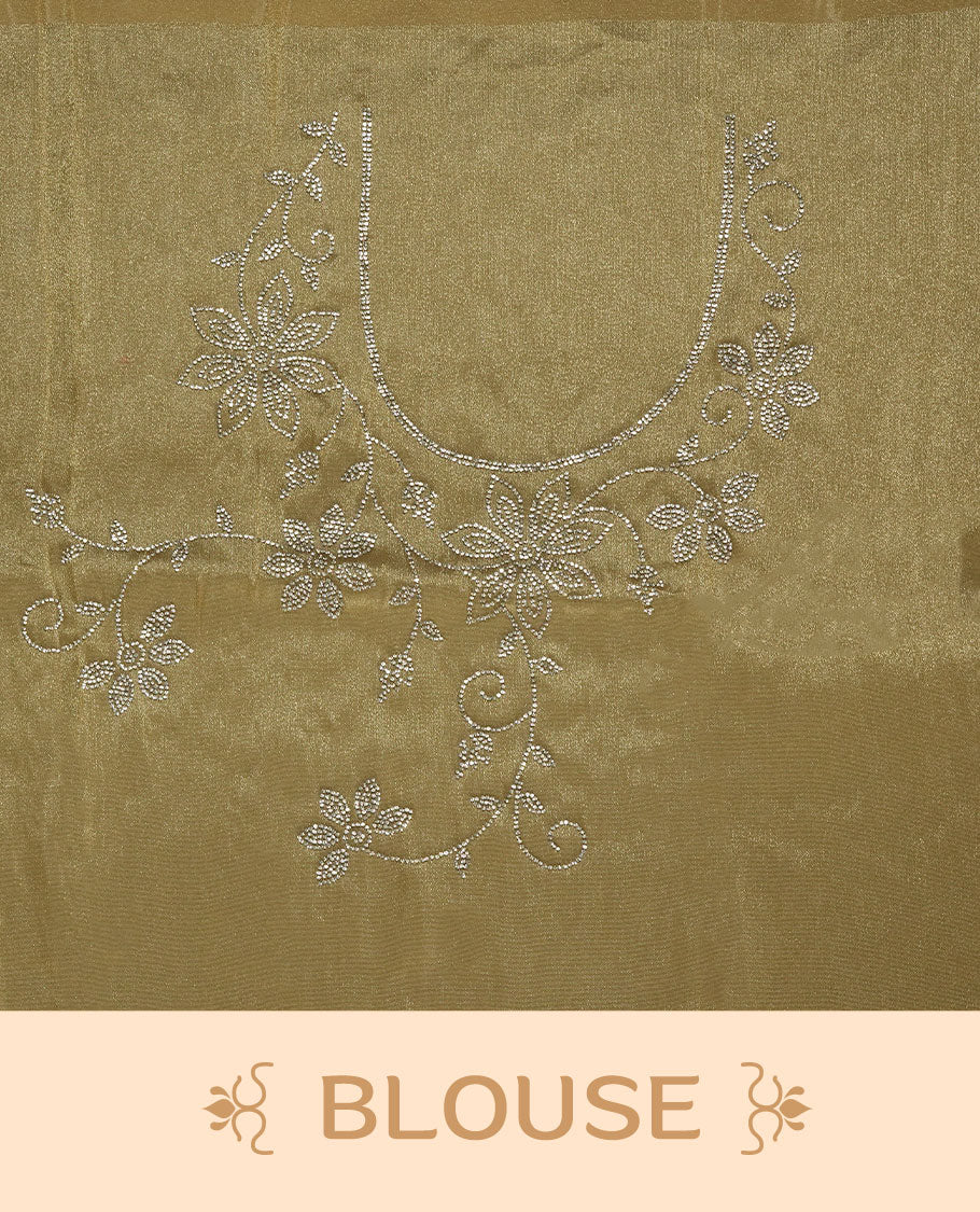 Golden Beige colour net shimmer fancy saree adorned with scattered white stone buttas all over the body, paired with a delicate stone worked border and matching blouse featuring floral vine stone embroidery