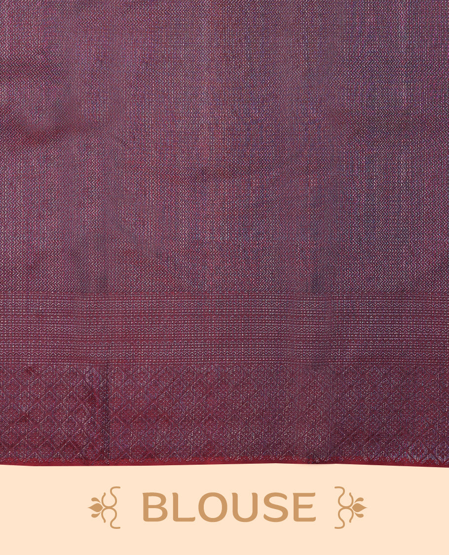 Maroon coloured Manthrakodi saree featuring a multicoloured zari jacquard body, complemented by a self coloured turning Banarasi border and a matching self coloured blouse.