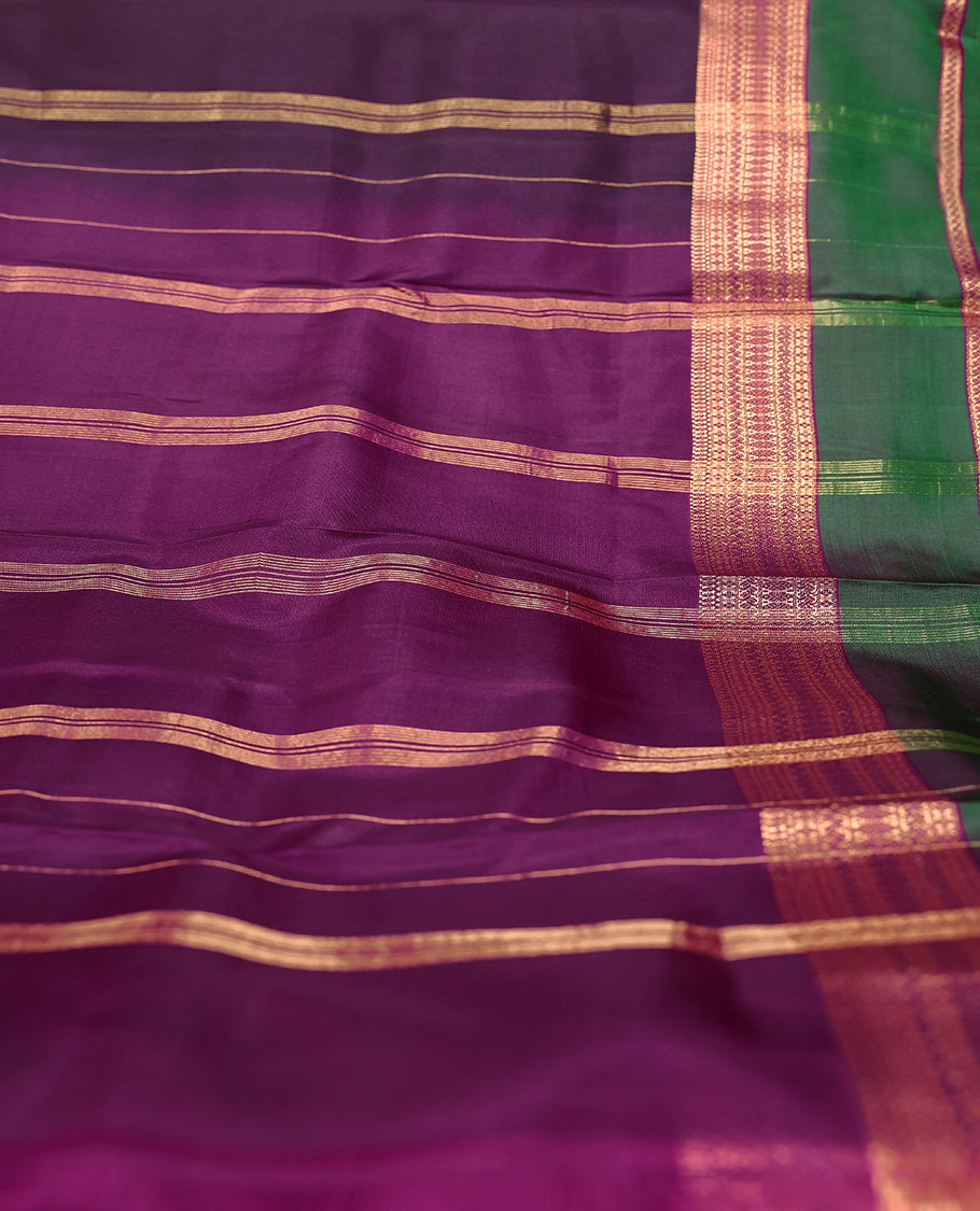 Dark Grape Colour Vasundhara Silk Saree having Plain Body with Green Colour Border and Light Grape Blouse