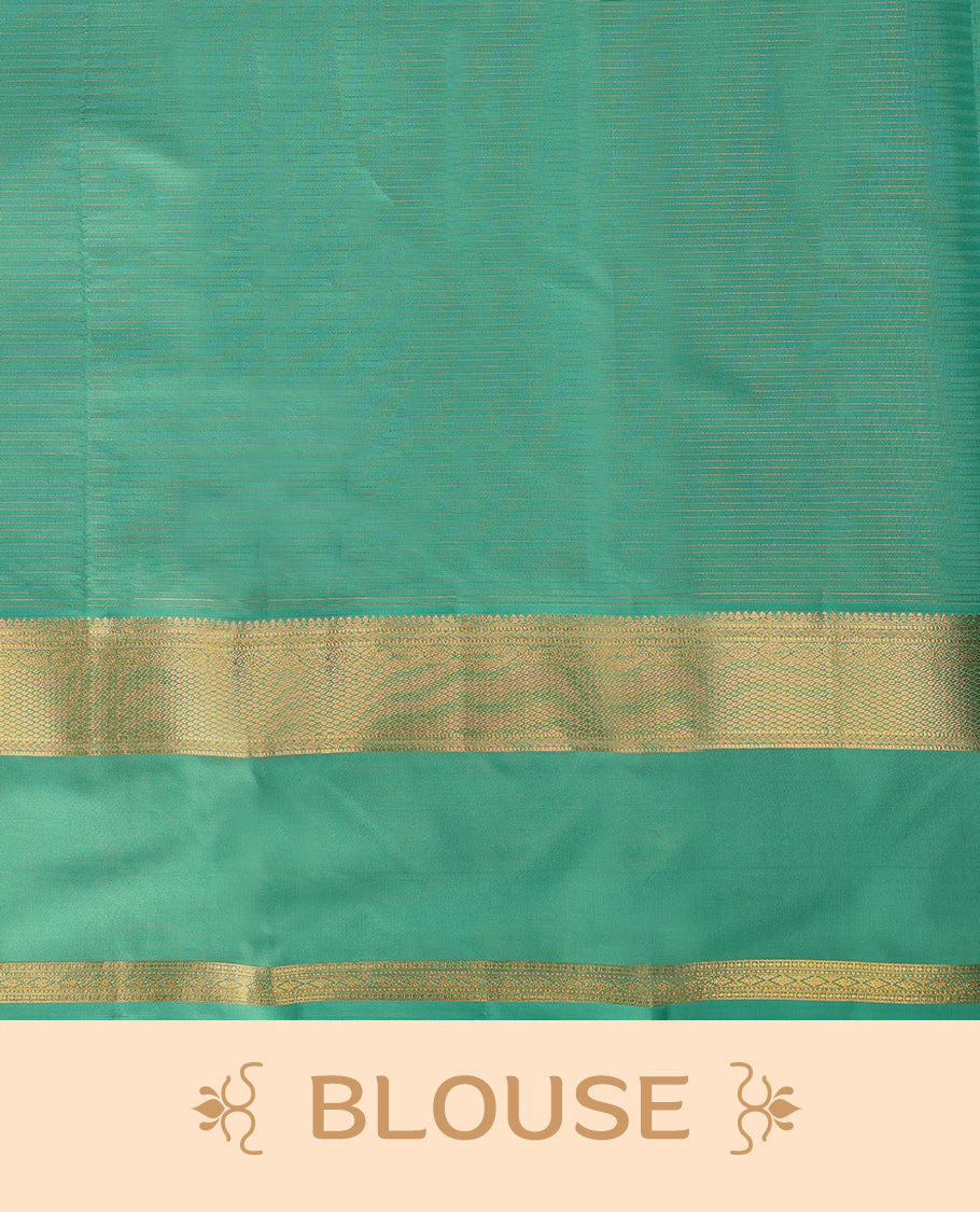 Purple Colour soft silk saree adorned with golden zari stripes on the body, complemented by an aqua colour traditional border and a matching contrast blouse