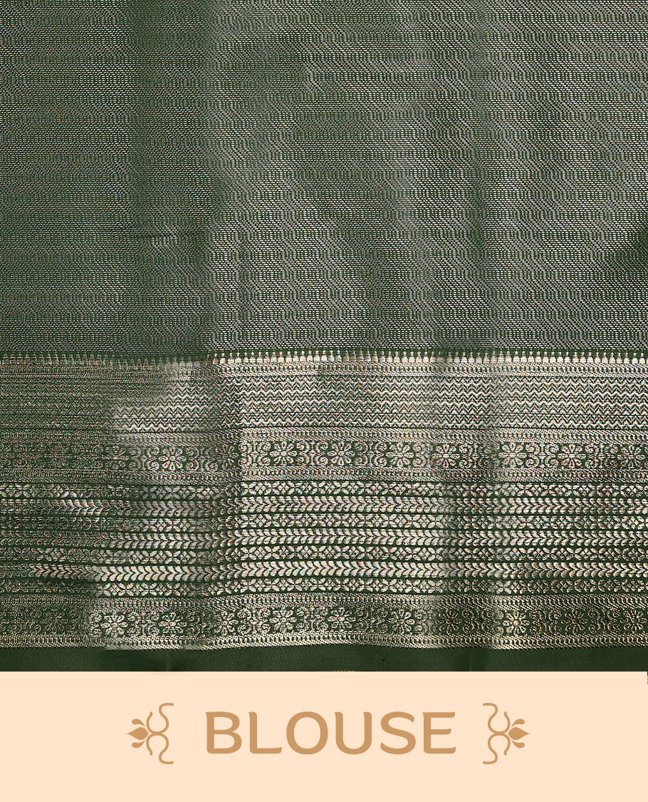 Dark Bottle Green Art Soft Silk Saree showcases intricate silver zari work on the body and border, paired with a matching blouse