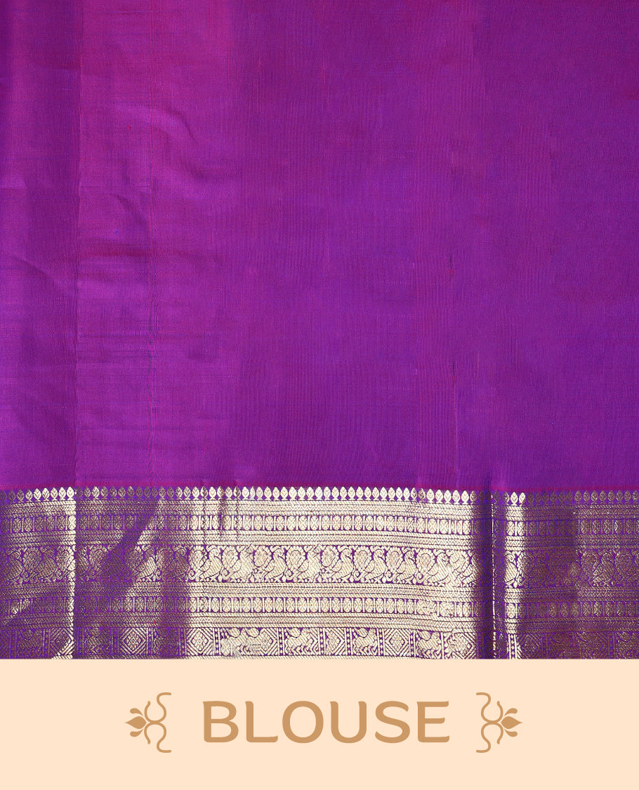 Peacock blue colour pure Kancheepuram saree with gold zari traditional paisley motifs on the body contrast traditional border with peacock, winged horse and chackram motifs grand pallu with diamond pattern paired with matching blouse