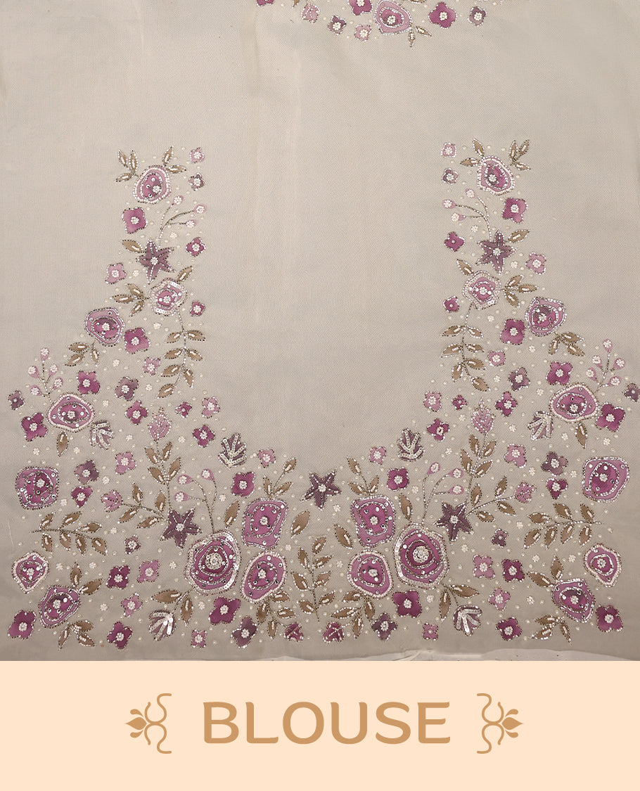 White colour pure organza saree featuring Light Purple floral prints with intricate bead and sequin work across the body, adorned with a matching embellished border, complemented by a worked pallu and paired with a heavily worked matching blouse.