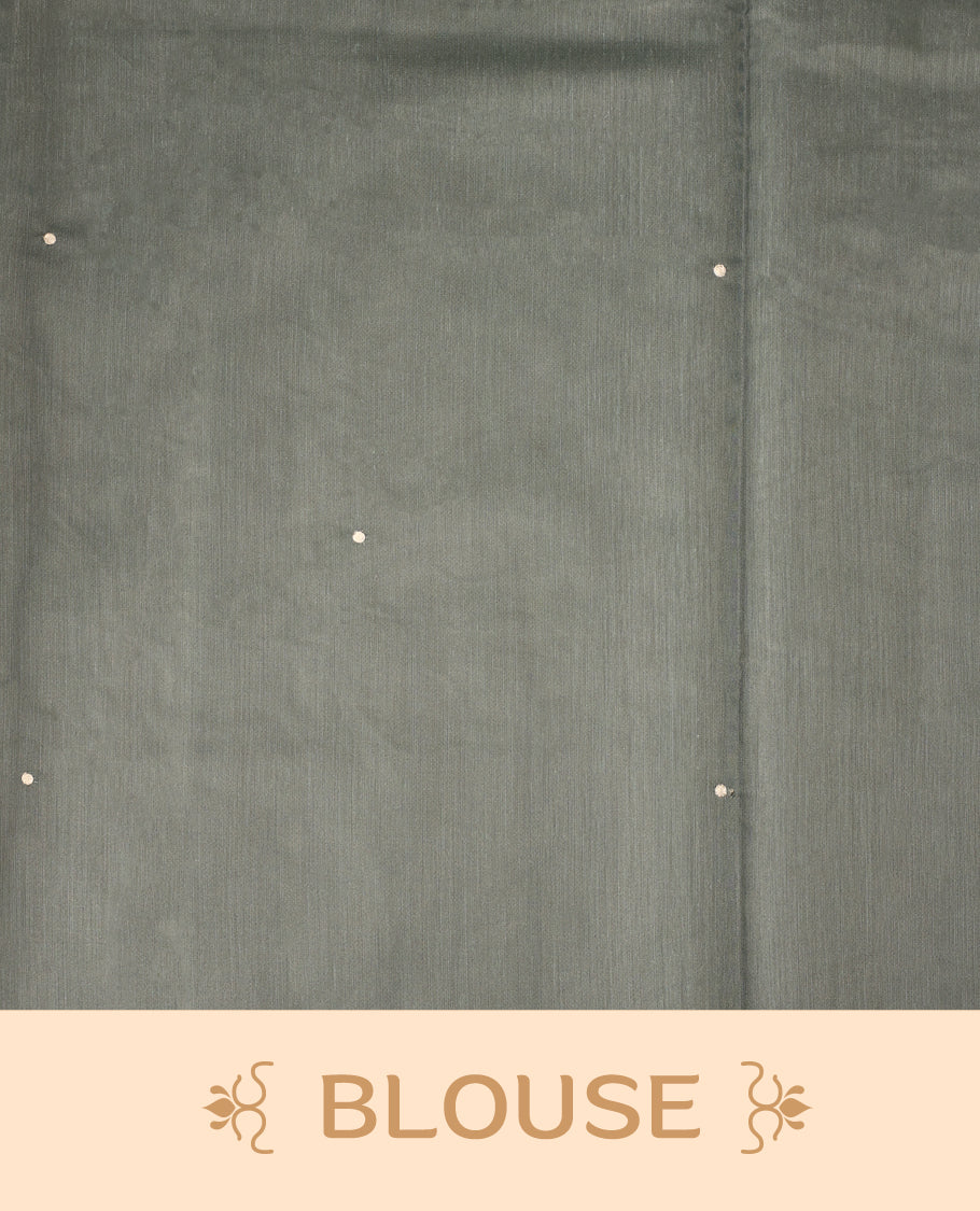 Cream colour Tussar cotton Kota saree featuring elegant stone blue leafy branch motifs across the body, accentuated with a subtle stone blue border, and paired with a matching blouse for a graceful and minimal look.