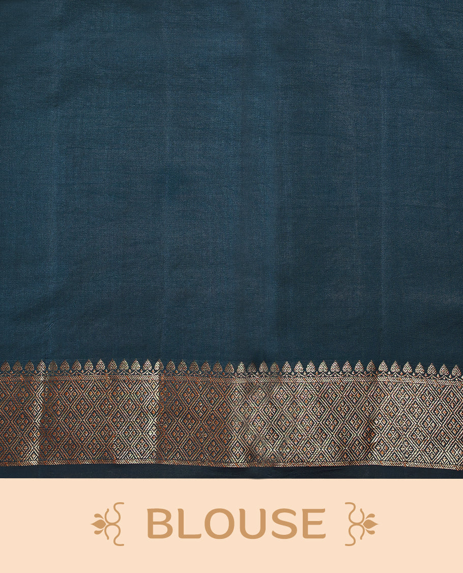 Beige Colour Pure Banaras Soft Silk Saree adorned with traditional antique zari motifs, paired with a hand dyed German Blue antique style border and a matching blouse.