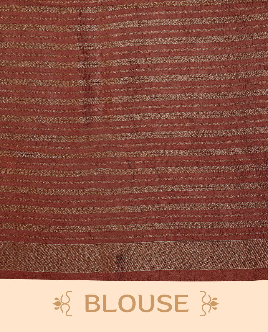 Rust Orange semi-Banaras tussar georgette saree adorned with antique zari floral motifs on the body, beautifully highlighted with a pencil art garden-inspired border, paired with a matching blouse.