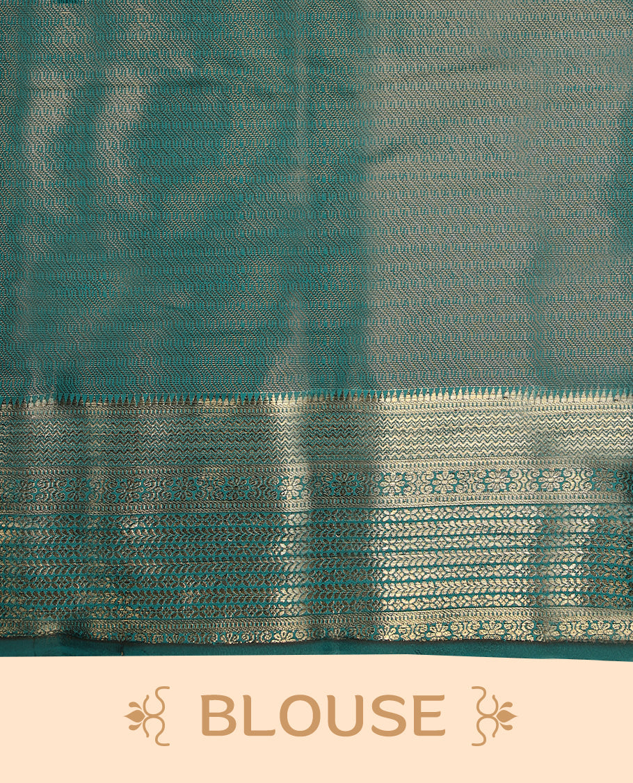 Teal Green Art Soft Silk Saree showcases intricate silver zari work on the body and border, paired with a matching blouse