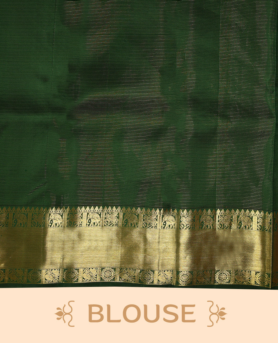 Bottle green Colour pure traditional Kancheepuramsilk saree featuring antique zari peacock and chakkram motifs on the body, complemented by a traditional border adorned with elephant and winged horse motifs, and paired with a matching Blouse