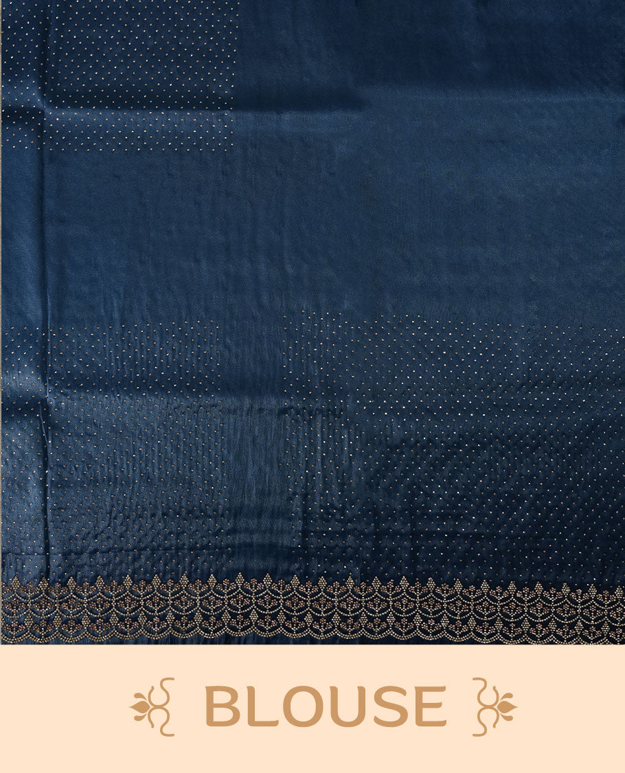Blue colour net shimmer fancy saree adorned with white stone buttas all over the body, paired with a delicate stone worked border, with matching blouse
