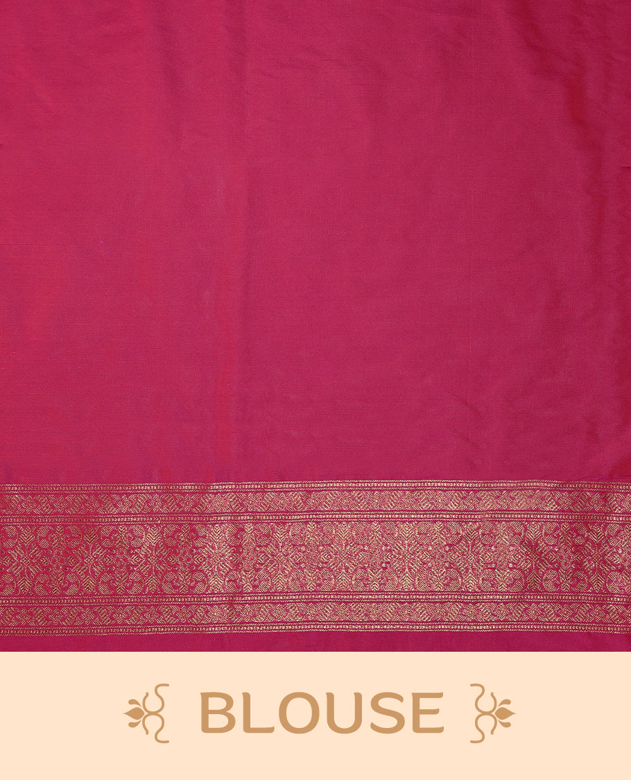 Magenta colour semi Banaras Katan saree featuring an antique Gold zari jacquard body, complemented by a self colour traditional border with a floral kodi design, paired with a matching blouse