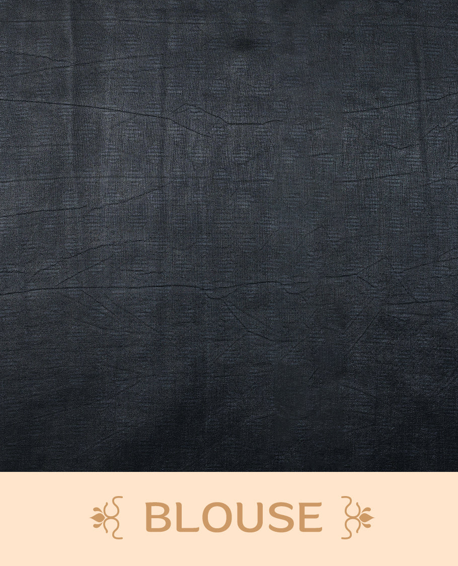 Charcoal black colour Manipuri saree featuring oversized teal and indigo floral motifs, finished without a border, and paired with a matching blouse.