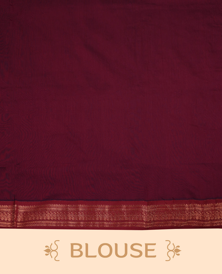 Bottle Green colour mixed Kalyani cotton saree featuring Copper zari Mango motifs throughout the body, paired with a Maroon colour traditional border and pallu, with matching blouse