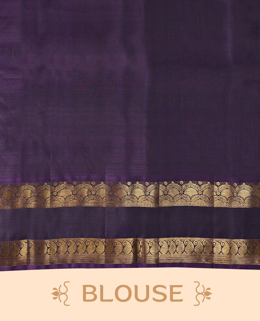 Deep teal blue Colour pure Kancheepuram silk saree with small peacock and elephant motifs, featuring a deep purple border with arched floral and paisley gold zari patterns, paired with a matching blouse.