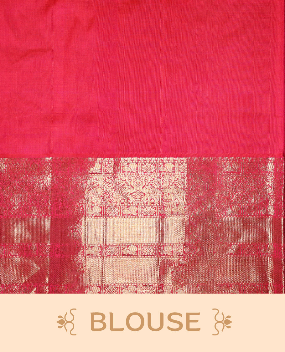 Rani pink colour pure Kancheepuram saree with gold zari Banarasi paisley mango motifs on the body traditional border with elephant peacock and chackram pattern grand pallu with floral chackara motifs paired with matching blouse