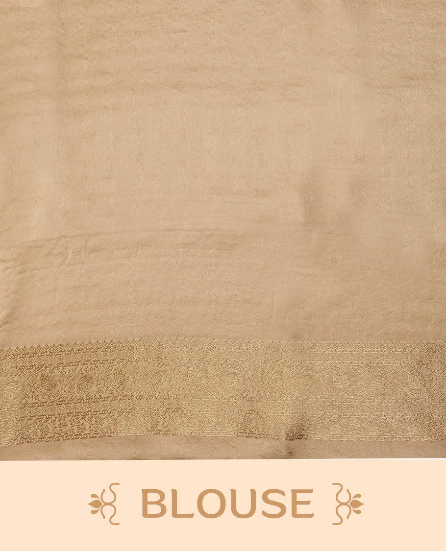 Champagne Gold semi-Banaras satin crepe saree featuring traditional closely woven buttas on the body, complemented by an antique-style border and a matching self-coloured blouse.