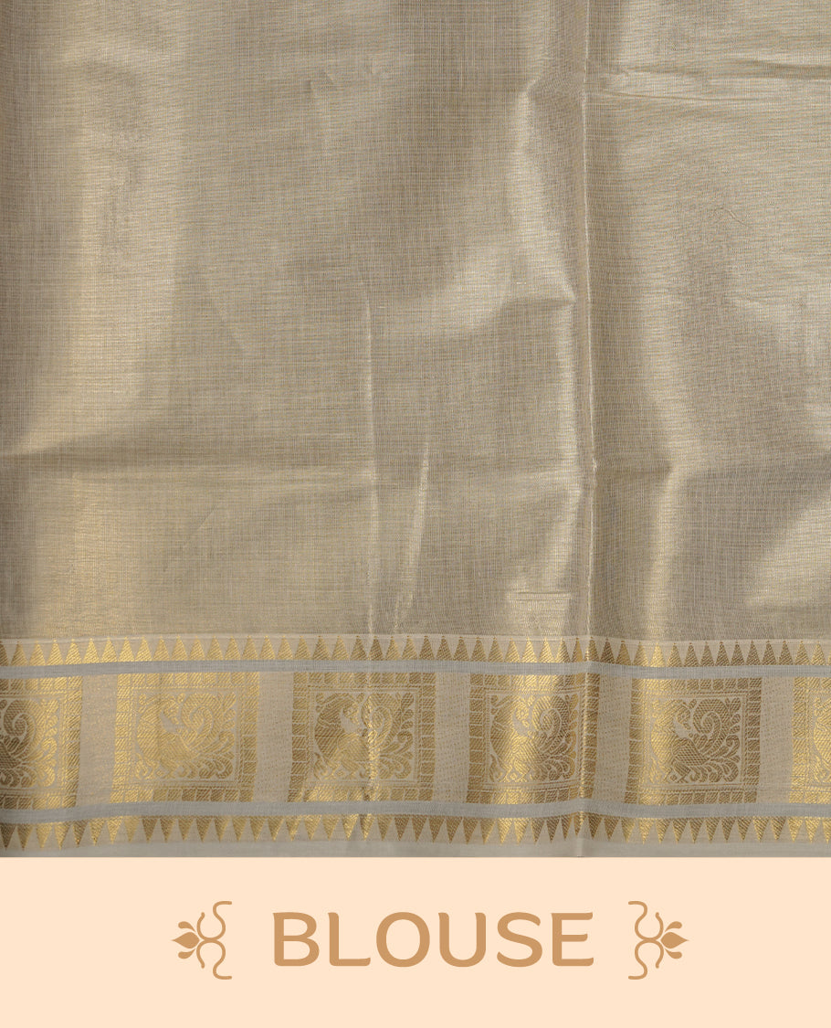 Elegant Light gold colour tissue Kerala saree with tree design gold zari buttas, broad kasavu border, and richly woven traditional pallu, paired with a matching blouse