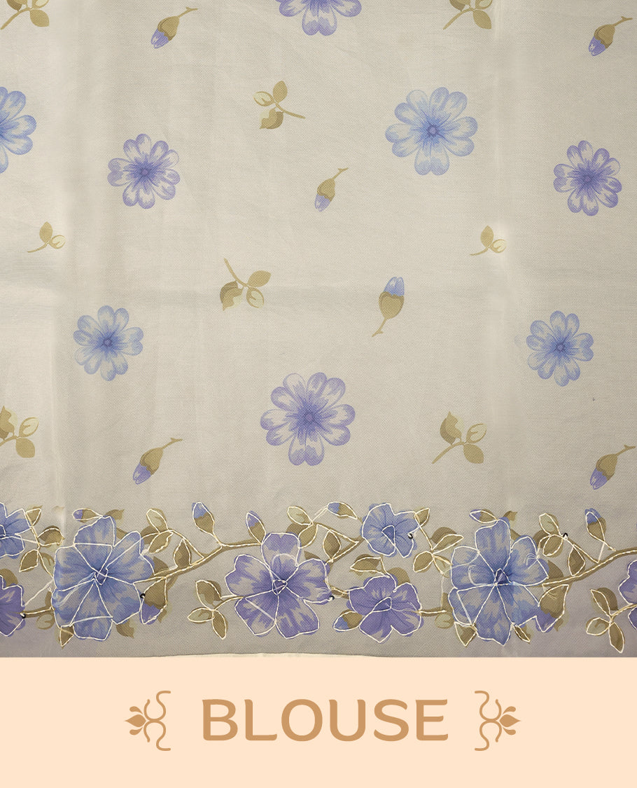 Ivory white colour organza saree adorned with blue floral print with thread detailing on the border and pallu, in a sheer finish that adds elegance, paired with a matching blouse for a graceful look.