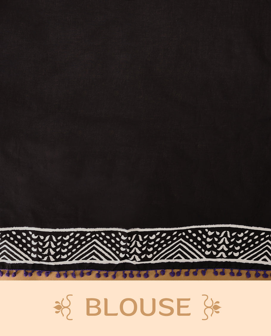 Black cotton saree features intricate white handblock prints, a beautifully detailed border with Violet piping and Self Coloured Blouse