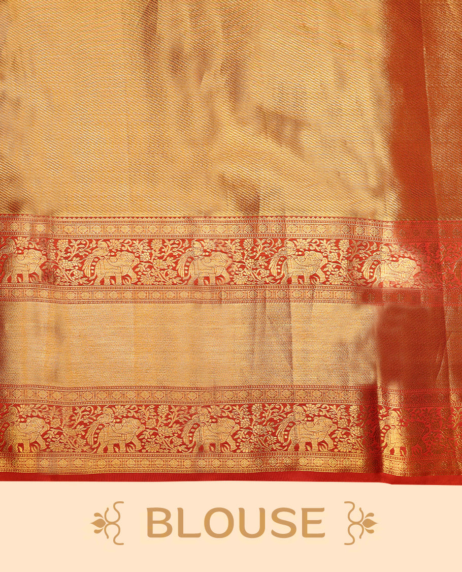 Gold Colour Kancheepuram tissue silk saree featuring an intricately woven antique zari jacquard design on the body, elegantly complemented by a bright red traditional border with elephant, bird, and Rudraksham motifs, and paired with a matching blouse.