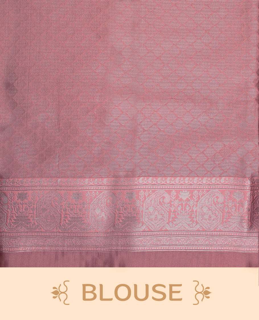 Dark Olive coloured semi silk saree featuring a Silver coloured Zari design on the body, paired with a Onion coloured border and blouse.