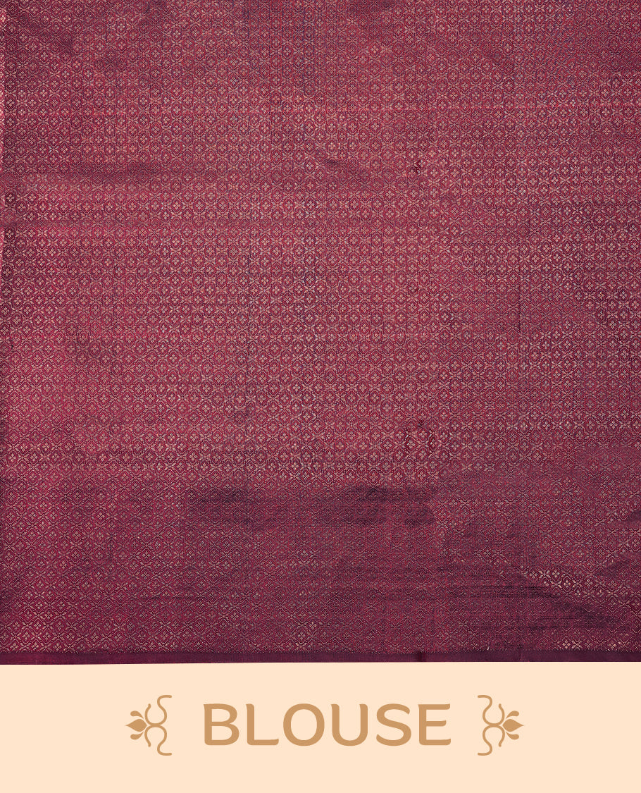Deep Maroon colour pure Mayuri silk saree featuring finely woven Golden zari motifs across the body, detailed with a subtle geometric self border with intricate texture, with matching blouse