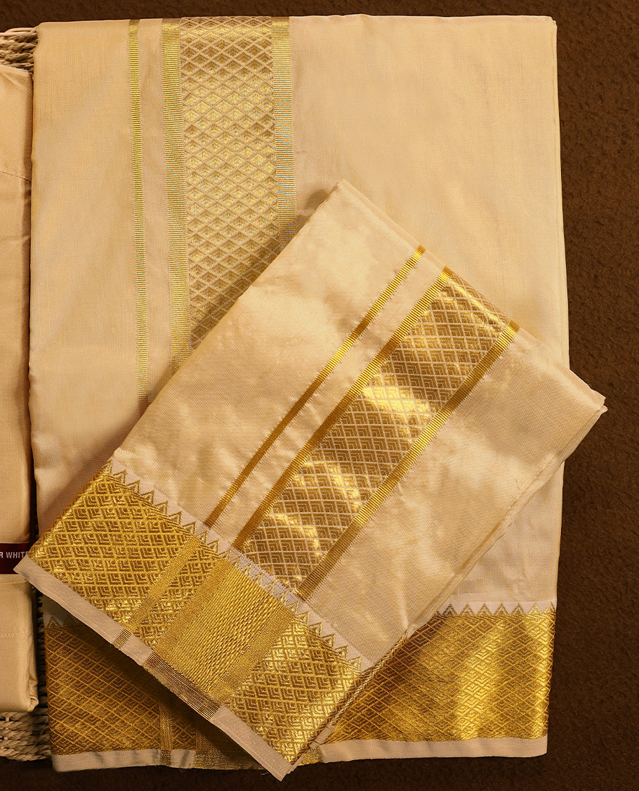 Medium gold coloured silk wedding shirt, dhoti, and towel set from MINISTER WHITE, featuring a gold zari border.